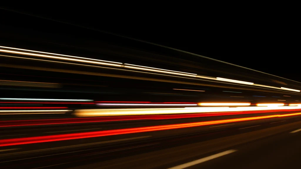 Abstract fast motion-blurred light streak racing on dark, editorial concept